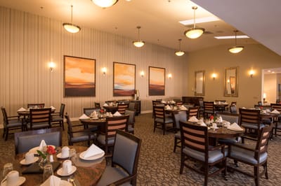 Dining area set up for a meal with decorative elements