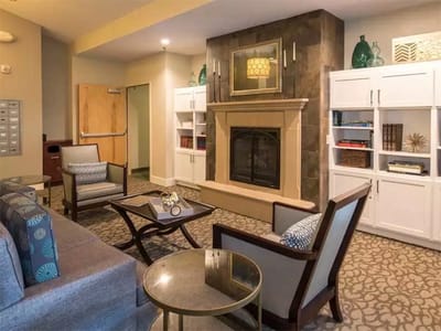Cozy common area with seating and fireplace