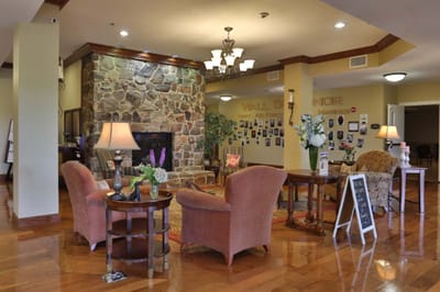 Interior view of a cozy common area with seating