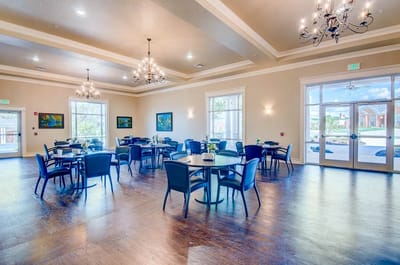 Bright dining room with tables and chairs