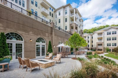 Outdoor seating area with landscaped gardens
