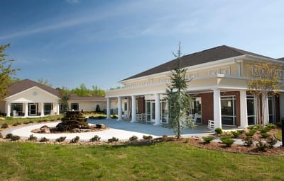 Exterior view of Mt. Carmel Community with landscaped garden