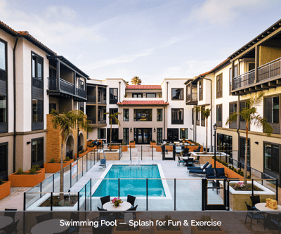 Swimming pool area with seating and palm trees