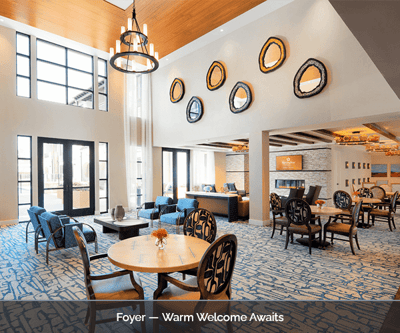 Bright and welcoming foyer area with comfortable seating
