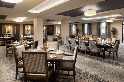 Elegant dining room setting with tables prepared for meals
