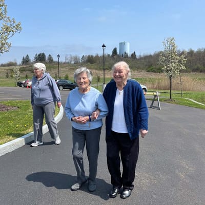 Two residents enjoying a walk outdoors