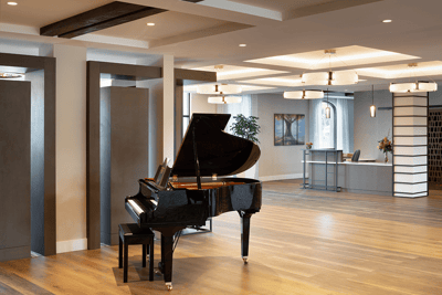 Interior view of a lobby featuring a grand piano