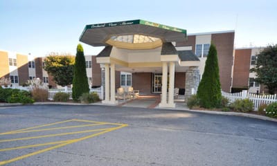 Entrance of Orchard View Manor with a canopy