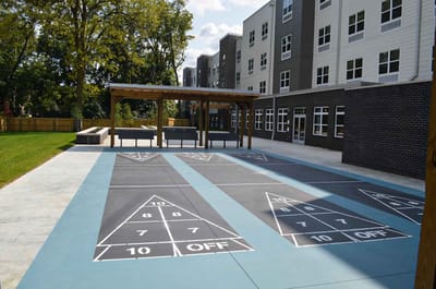 Outdoor shuffleboard area at a senior living facility