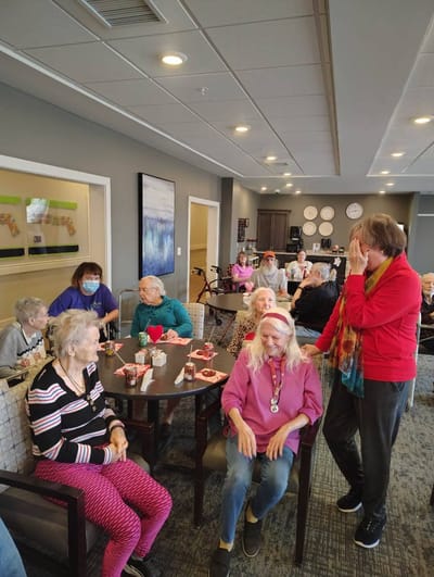 Residents enjoying social time in a common area