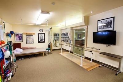 Rehabilitation room with equipment for therapy