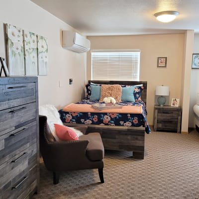 Cozy private resident room with floral decor