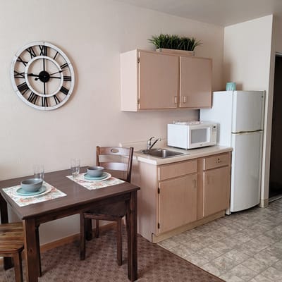 A cozy kitchen area with a dining table