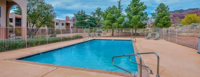 Swimming pool area with surrounding landscape