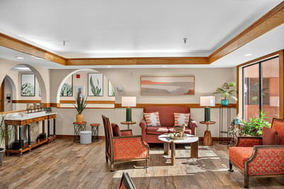 Bright common area with comfortable seating and decor