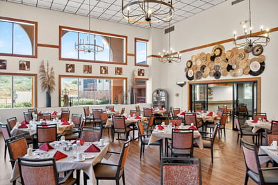 Dining room with tables set for meals