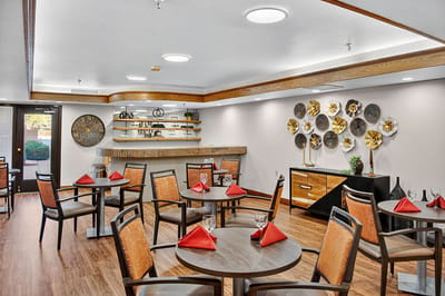 Dining area with tables set for a meal