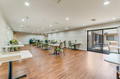 Interior dining area with tables and chairs