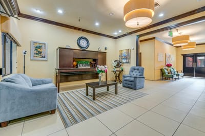 Bright common area with comfortable seating and decor