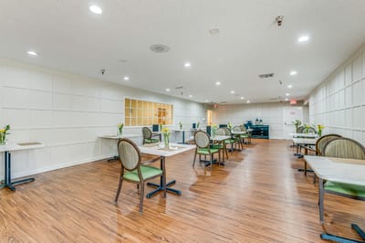 Dining area with tables and chairs arranged neatly