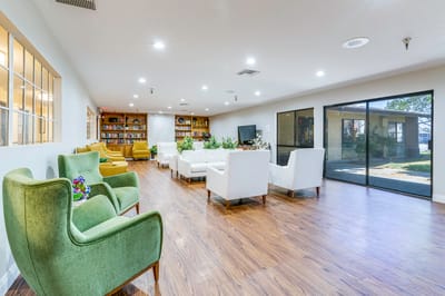Bright, modern interior common area with seating