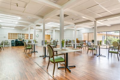 Dining room with tables and chairs in a spacious area