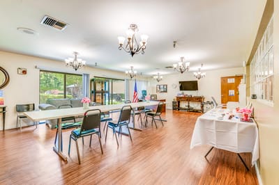 Bright common area with tables and chairs