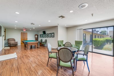 Interior common area with pool table and seating