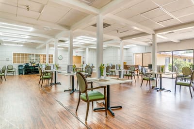 Interior dining area with tables and chairs