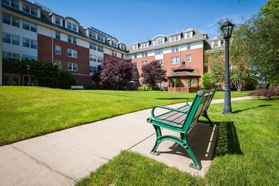 Outdoor seating area with a view of the facility