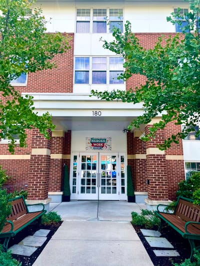 Entrance of Providence House Assisted Living with landscaping