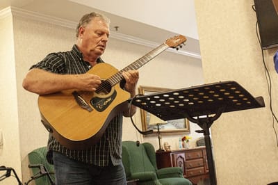Music performance by a resident or staff member.