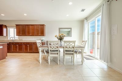 Bright dining area with chairs and a table