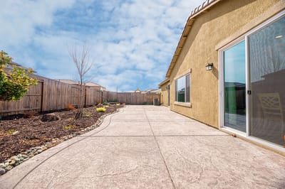 A well-maintained outdoor patio area