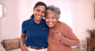 True Care Home Care – Bronx, home care in Bronx, NY — Caregiver and senior woman smiling together in a home setting