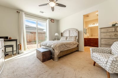 A cozy private bedroom with natural light