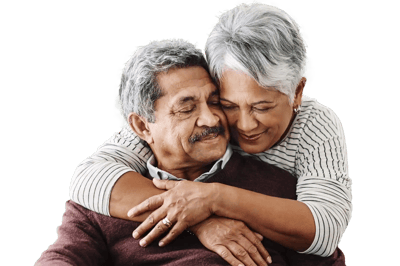 Two seniors embracing, showing affection.