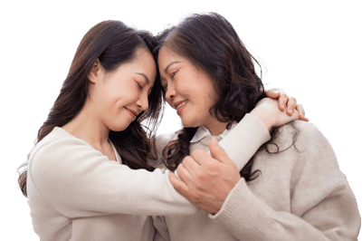 A warm embrace between a younger and older woman.