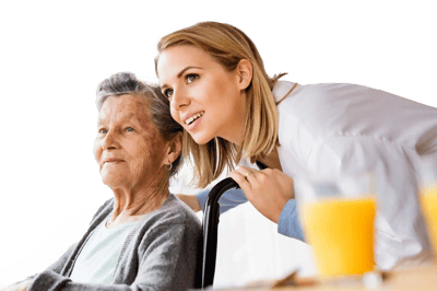 A caregiver with a resident sharing a moment.