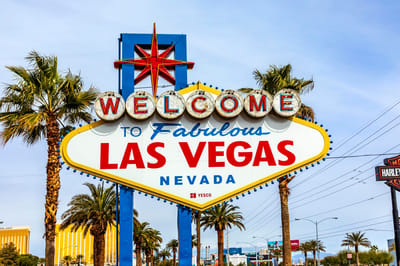 Welcome to Fabulous Las Vegas sign with palm trees
