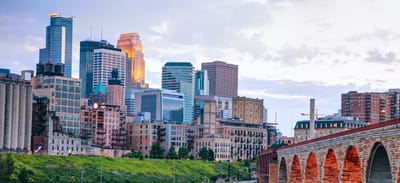 City skyline with buildings and a bridge