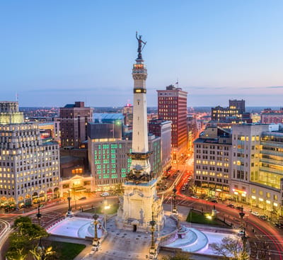 Aerial view of a city monument at dusk