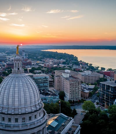 Aerial view of a city at sunset