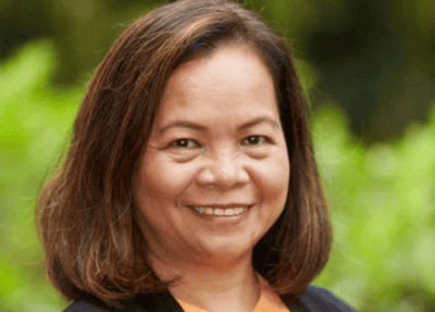 Smiling woman in a natural outdoor setting