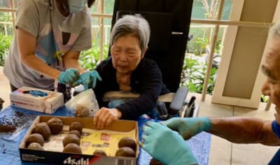 Residents engaging in a gardening activity.