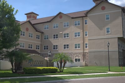 Exterior view of Discovery Village At Tampa Palms building