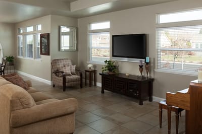 Bright common area with seating and natural light