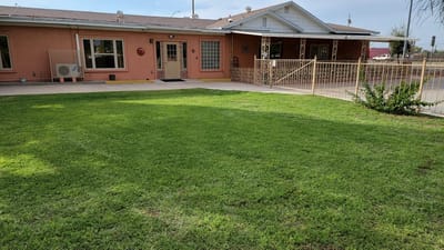 Exterior view of Casa De Bellamie with grassy area