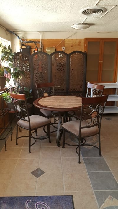 Cozy dining area with a round table and chairs