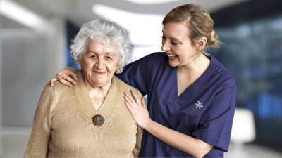 Caregiver and resident enjoying a moment together